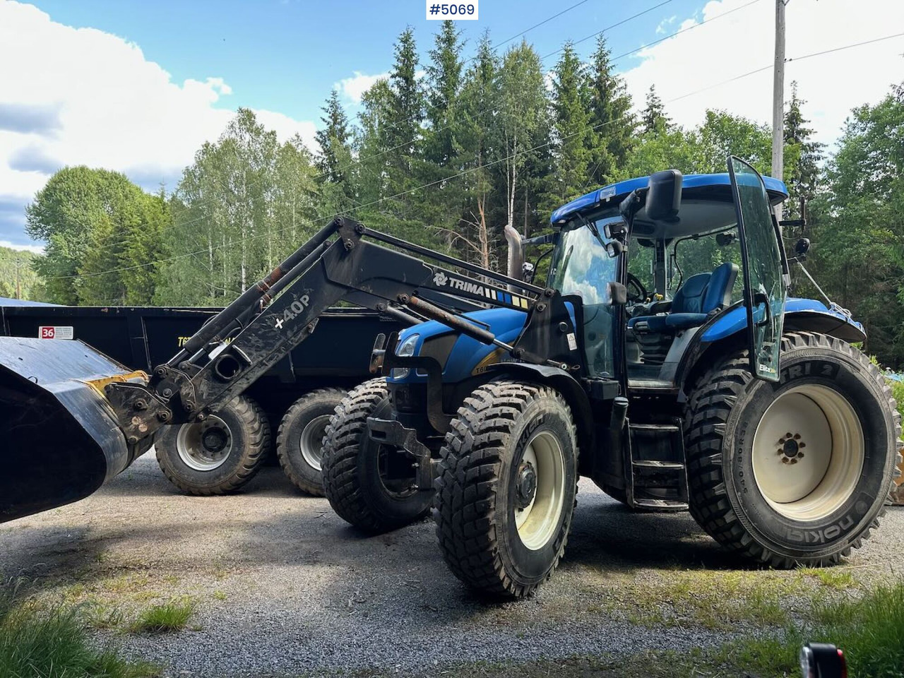 2009 New Holland T6040 SS w/ Trima front loader - Tractor: afbeelding 1 2009 New Holland T6040 SS w/ Trima front loader - Tractor: afbeelding 1