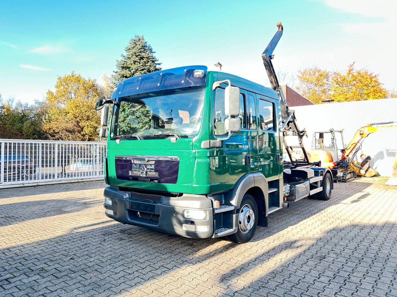 MAN 12.250 Doppelkabine Abroller - Haakarmsysteem vrachtwagen: afbeelding 2 MAN 12.250 Doppelkabine Abroller - Haakarmsysteem vrachtwagen: afbeelding 2
