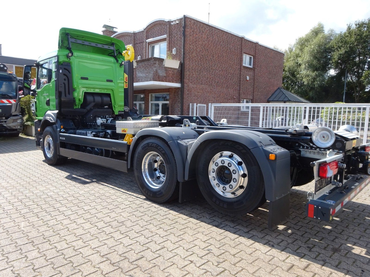 MAN 26.520 TGS HYVA Abroller 6x2 NEU - Haakarmsysteem vrachtwagen: afbeelding 4 MAN 26.520 TGS HYVA Abroller 6x2 NEU - Haakarmsysteem vrachtwagen: afbeelding 4