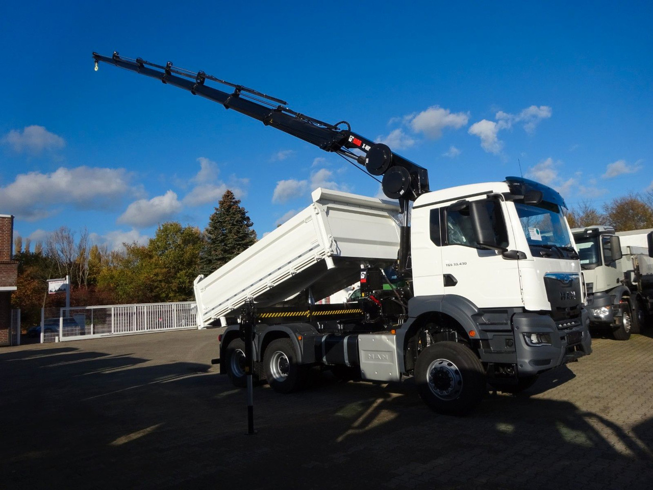 MAN 33.430 6x6 3-SEITENKIPPER KRAN HIAB 228- 6HYDRO - Kipper vrachtwagen, Kraanwagen: afbeelding 1 MAN 33.430 6x6 3-SEITENKIPPER KRAN HIAB 228- 6HYDRO - Kipper vrachtwagen, Kraanwagen: afbeelding 1