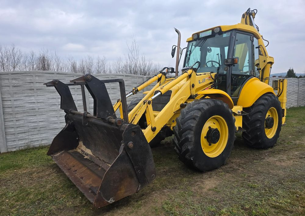 New Holland - Graaflaadmachine: afbeelding 1 New Holland - Graaflaadmachine: afbeelding 1