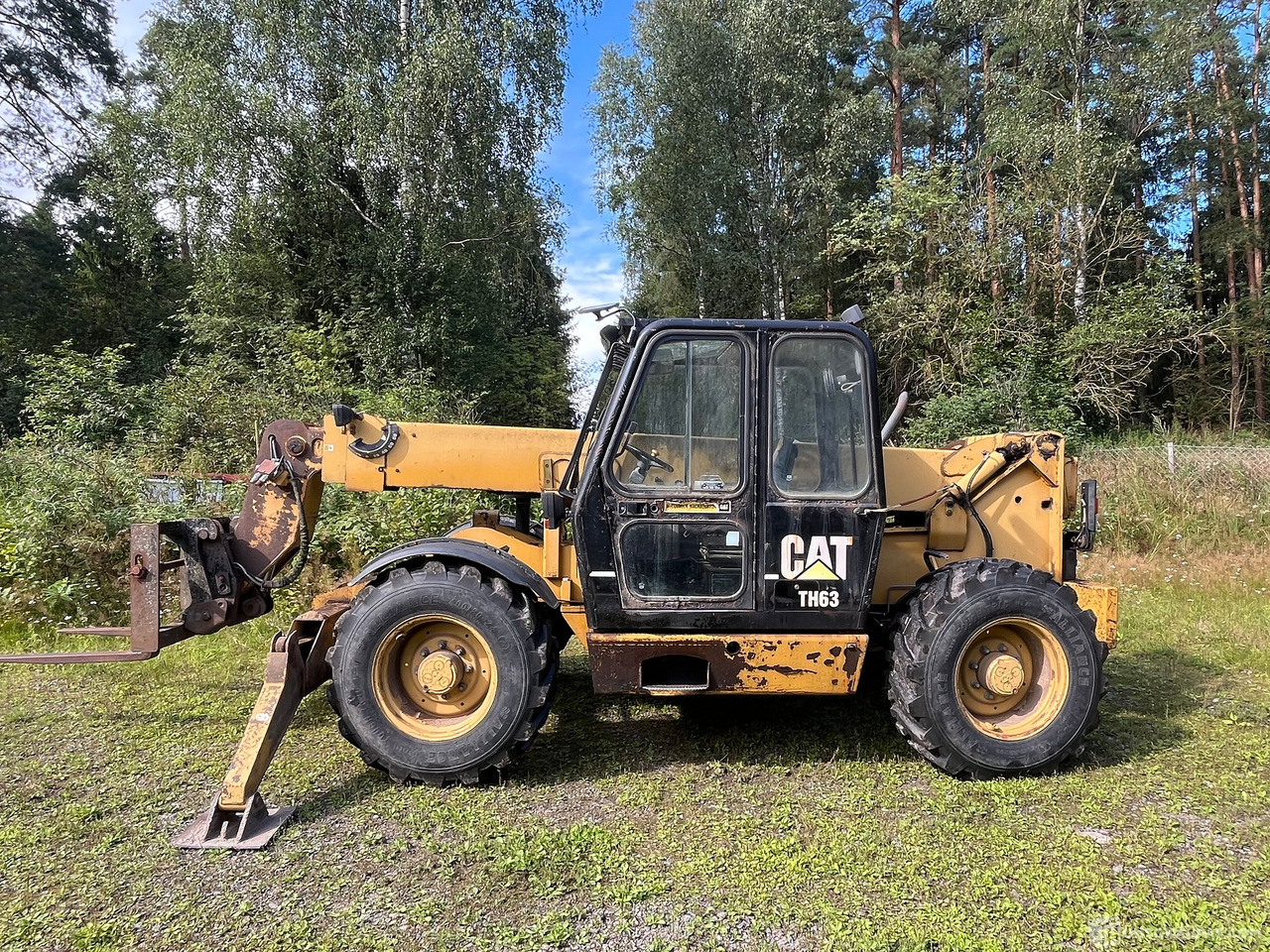 Caterpillar TH63, kurottaja piikeillä ja kauhalla, 2002, Loppi - Landbouwmachine: afbeelding 3 Caterpillar TH63, kurottaja piikeillä ja kauhalla, 2002, Loppi - Landbouwmachine: afbeelding 3