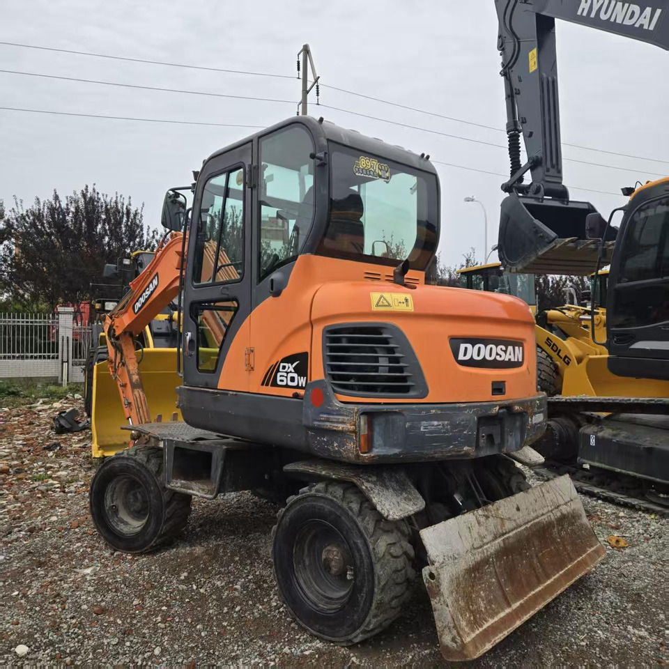 DOOSAN DX60W - Mobiele graafmachine: afbeelding 5 DOOSAN DX60W - Mobiele graafmachine: afbeelding 5
