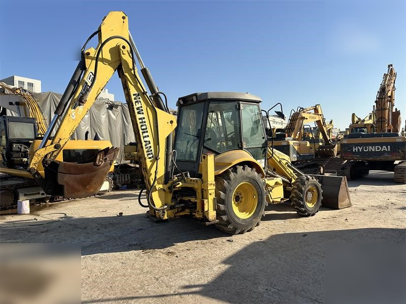 NEW HOLLAND LB95B-4PT - Graaflaadmachine: afbeelding 1 NEW HOLLAND LB95B-4PT - Graaflaadmachine: afbeelding 1