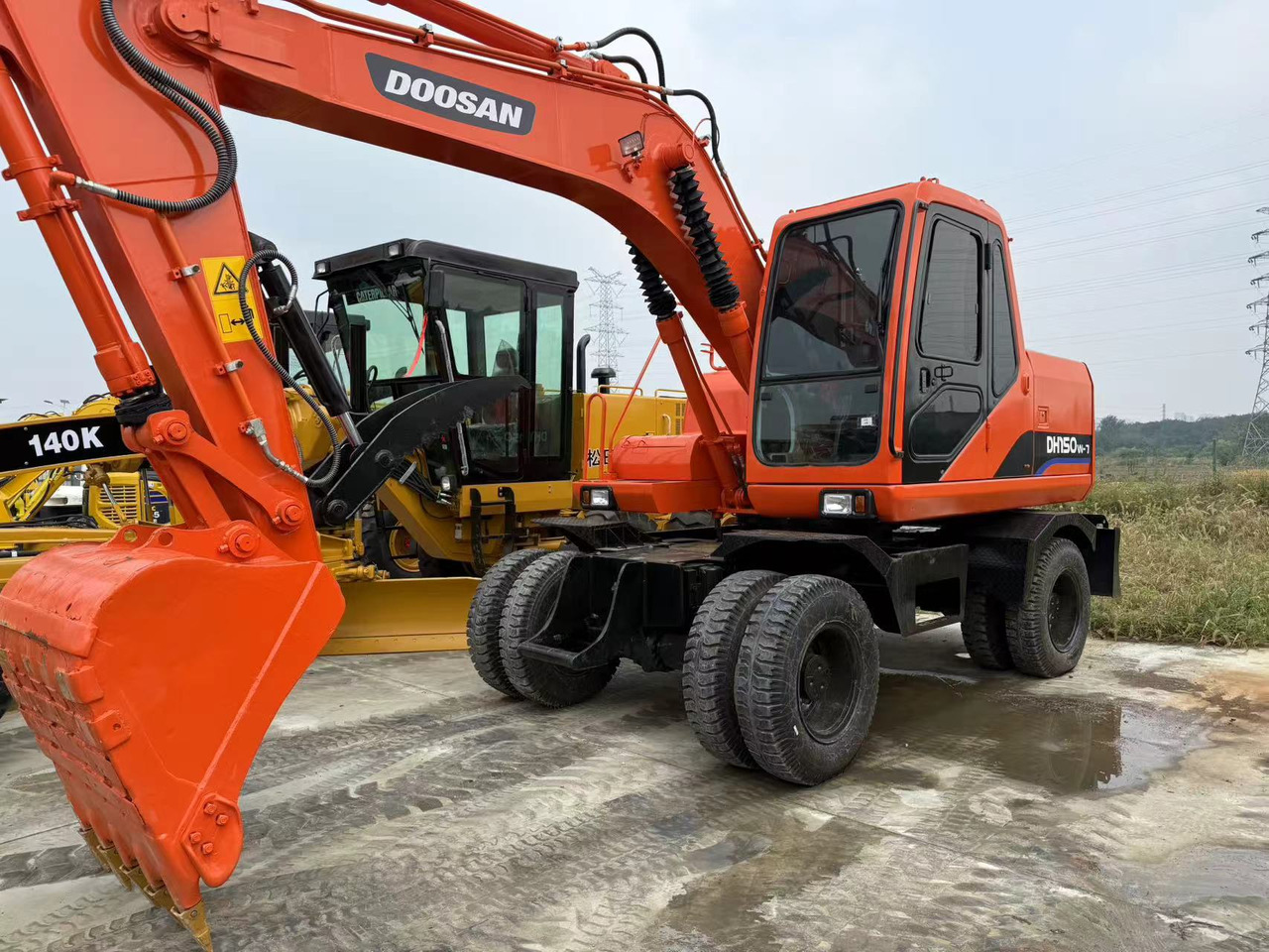 DOOSAN Good Condition Original Doosan DH150w-7 Wheel Excavator 15 Tons Used Doosan Dh150w-7 Excavator Used Wheel Excavator for Sale - Mobiele graafmachine: afbeelding 1 DOOSAN Good Condition Original Doosan DH150w-7 Wheel Excavator 15 Tons Used Doosan Dh150w-7 Excavator Used Wheel Excavator for Sale - Mobiele graafmachine: afbeelding 1