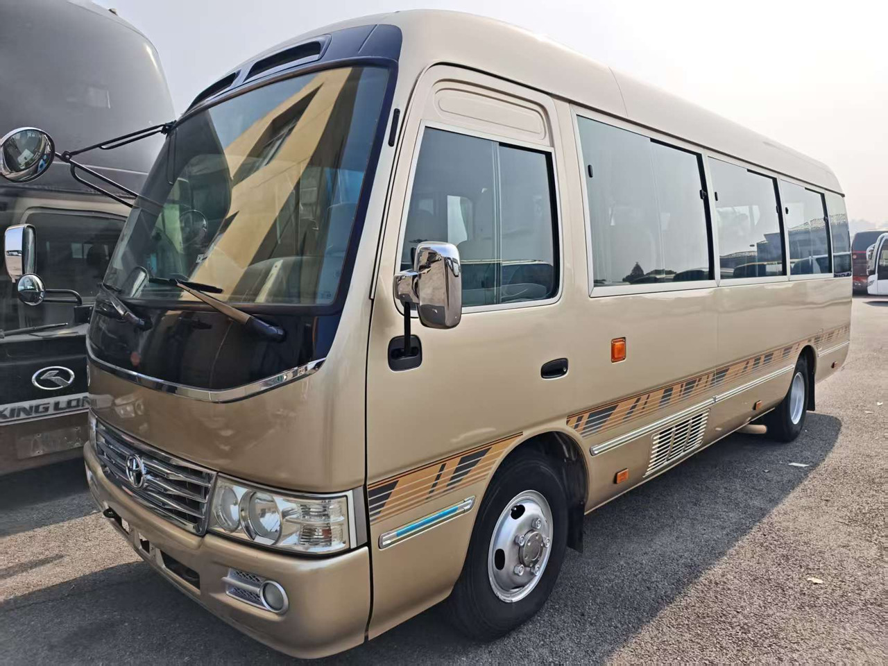 TOYOTA COASTER 23 seats - Touringcar: afbeelding 1 TOYOTA COASTER 23 seats - Touringcar: afbeelding 1