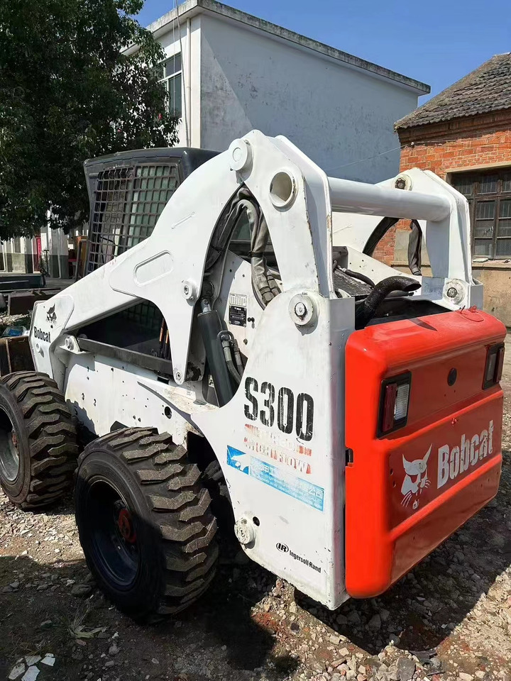 High Quality Mini Construction Machine Used Bobcat Skid Steer Loader S300 in Stock for Sale Bobcat Loader With Low Price - Schranklader: afbeelding 4 High Quality Mini Construction Machine Used Bobcat Skid Steer Loader S300 in Stock for Sale Bobcat Loader With Low Price - Schranklader: afbeelding 4