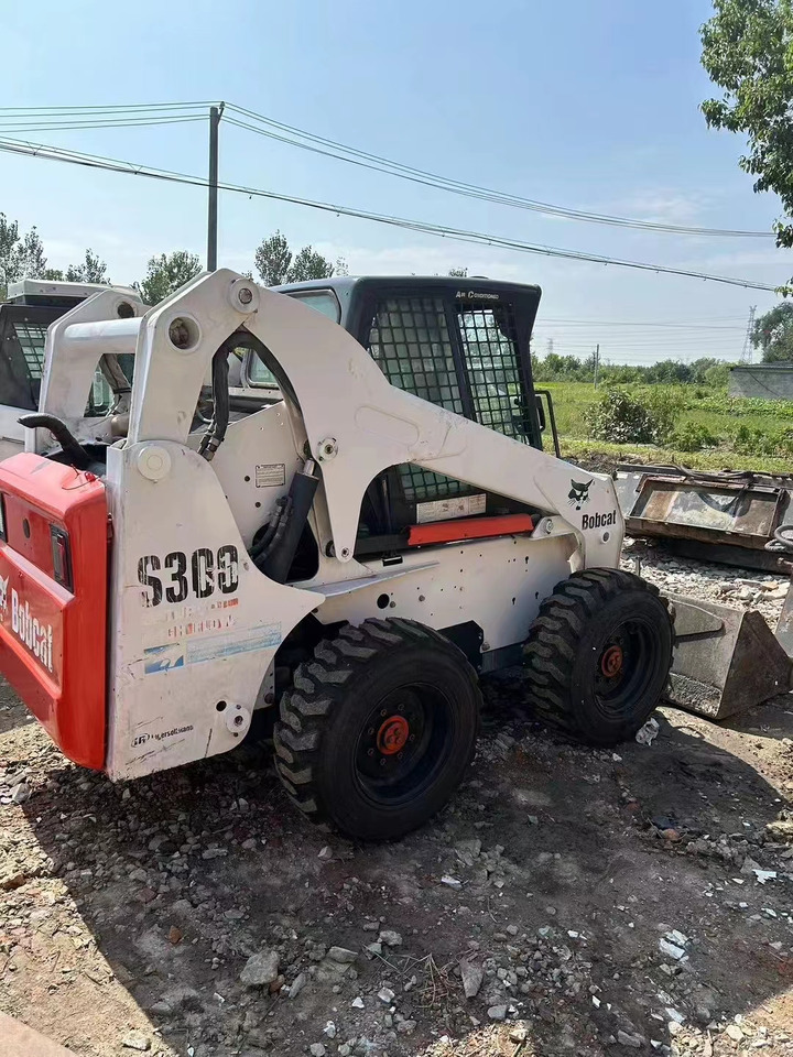 High Quality Mini Construction Machine Used Bobcat Skid Steer Loader S300 in Stock for Sale Bobcat Loader With Low Price - Schranklader: afbeelding 2 High Quality Mini Construction Machine Used Bobcat Skid Steer Loader S300 in Stock for Sale Bobcat Loader With Low Price - Schranklader: afbeelding 2