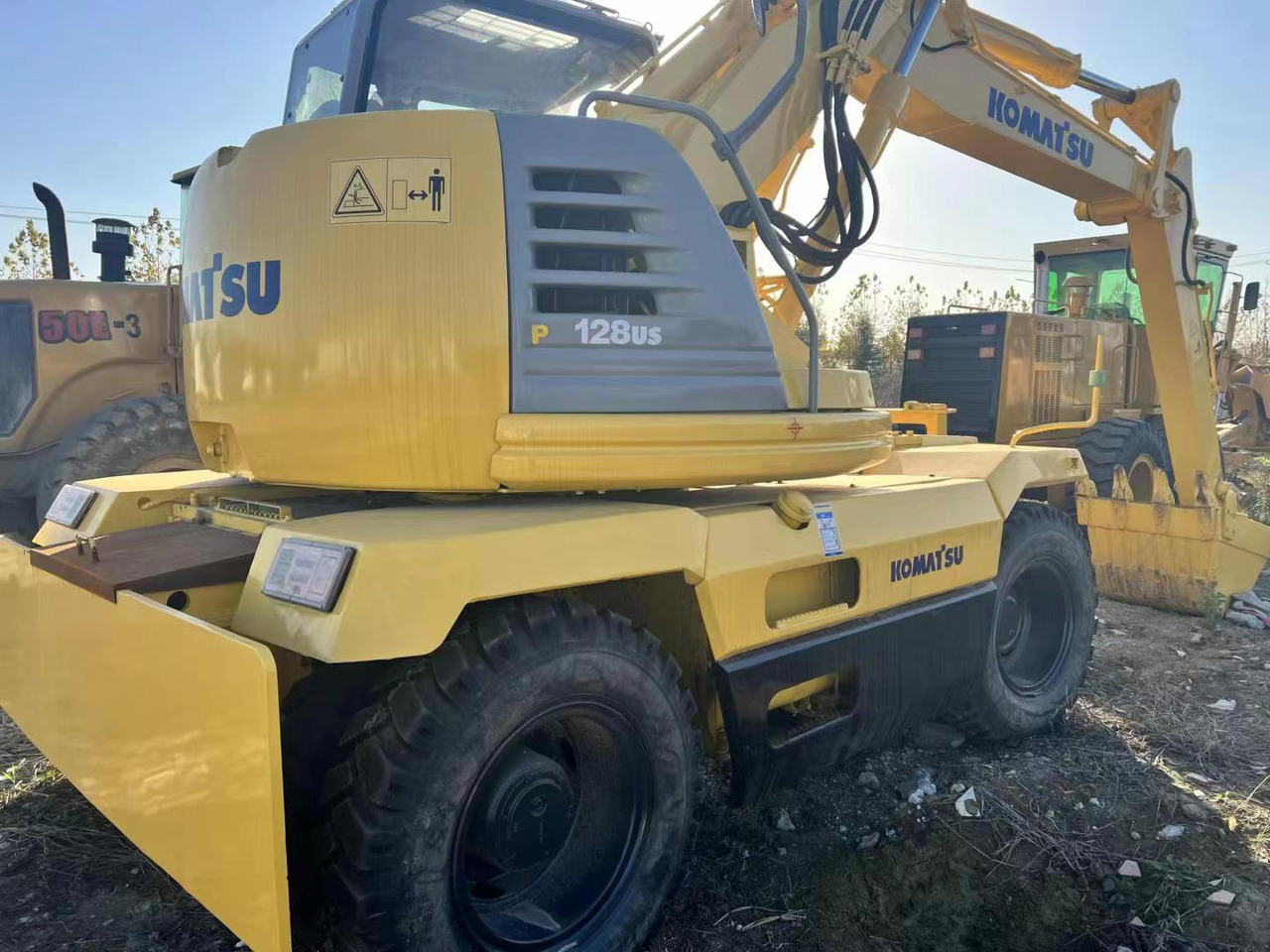 KOMATSU PC128US - Mobiele graafmachine: afbeelding 2 KOMATSU PC128US - Mobiele graafmachine: afbeelding 2