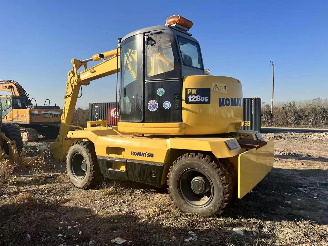 KOMATSU PC128US - Mobiele graafmachine: afbeelding 1 KOMATSU PC128US - Mobiele graafmachine: afbeelding 1