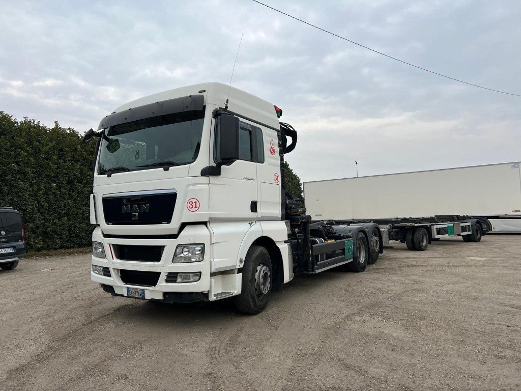 MAN TGX 26.480 SCARRABILE CON GRU - Haakarmsysteem vrachtwagen, Kraanwagen: afbeelding 1 MAN TGX 26.480 SCARRABILE CON GRU - Haakarmsysteem vrachtwagen, Kraanwagen: afbeelding 1