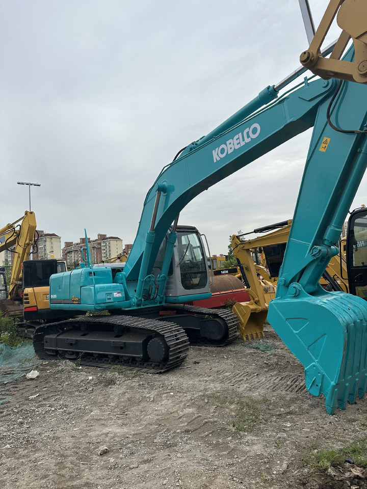 Hitachi Excavator SK200 Click for Discount - Rupsgraafmachine: afbeelding 1 Hitachi Excavator SK200 Click for Discount - Rupsgraafmachine: afbeelding 1