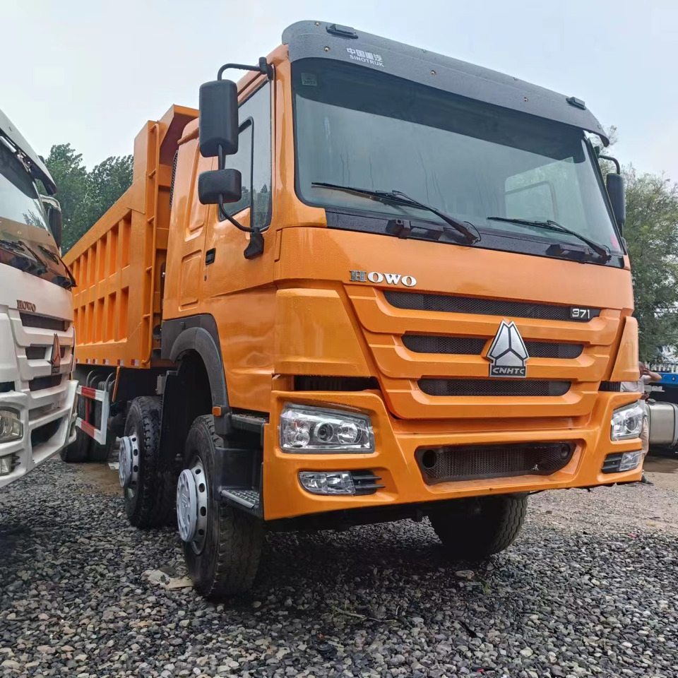 SINOTRUK 8x4 HOWO Dump Truck Click for Discount - Kipper vrachtwagen: afbeelding 2 SINOTRUK 8x4 HOWO Dump Truck Click for Discount - Kipper vrachtwagen: afbeelding 2