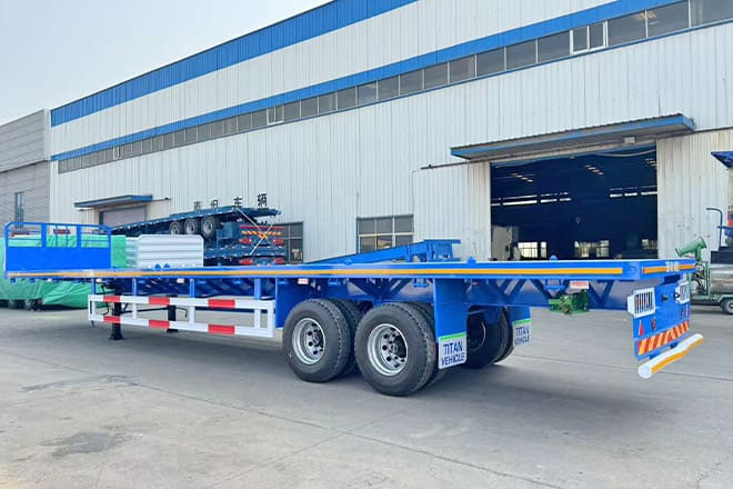 TITAN 2 Axle 45 Ft Flatbed Trailers for Sale in Algeria - Vlakke/ Open oplegger: afbeelding 1 TITAN 2 Axle 45 Ft Flatbed Trailers for Sale in Algeria - Vlakke/ Open oplegger: afbeelding 1