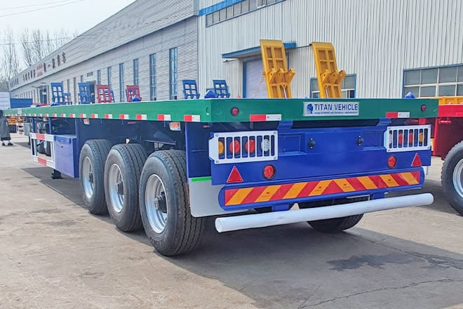 TITAN Flatbed Trailers for Semi Trucks Sizes for Sale in Guinea - Vlakke/ Open oplegger: afbeelding 1 TITAN Flatbed Trailers for Semi Trucks Sizes for Sale in Guinea - Vlakke/ Open oplegger: afbeelding 1