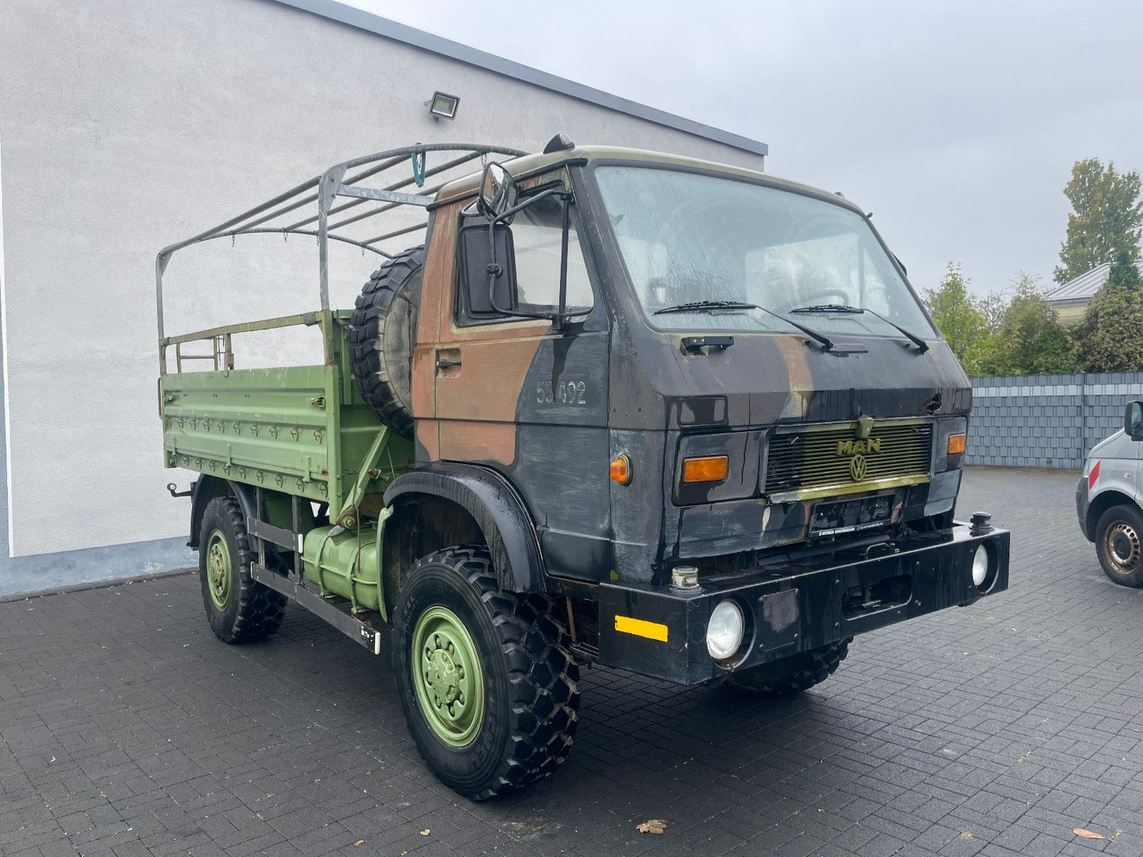 MAN 8.136 4X4 - Bestelwagen met open laadbak: afbeelding 1 MAN 8.136 4X4 - Bestelwagen met open laadbak: afbeelding 1