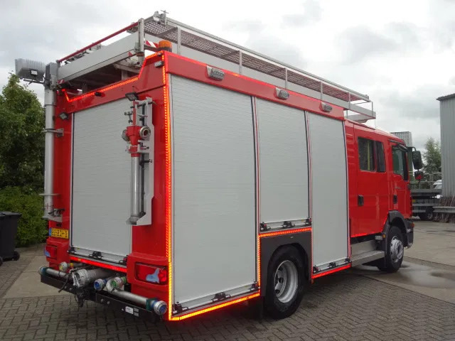 MAN TGM 15.250 FIRE TRUCK,2000 LITER TANK, FOAM TANK, AIRCO - Brandweerwagen: afbeelding 4 MAN TGM 15.250 FIRE TRUCK,2000 LITER TANK, FOAM TANK, AIRCO - Brandweerwagen: afbeelding 4