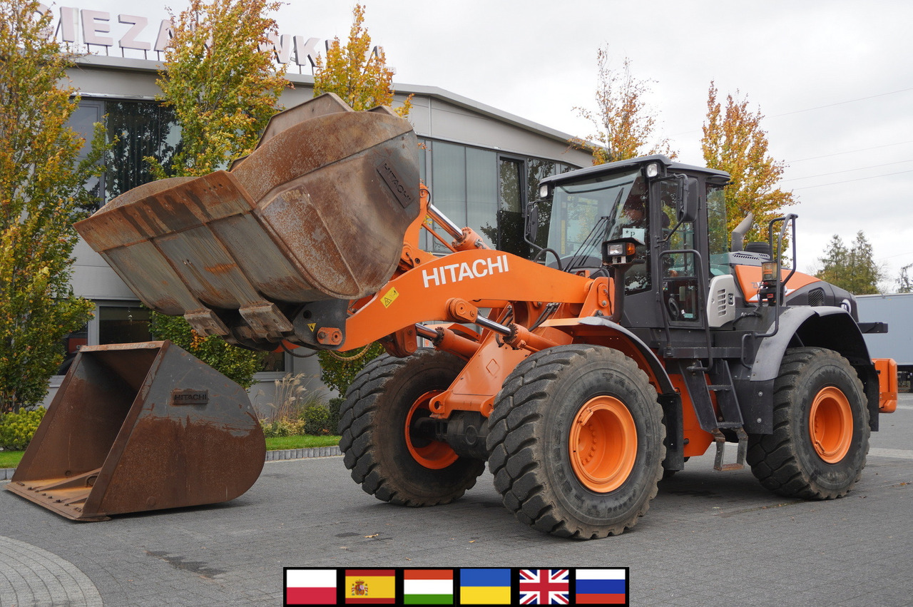HITACHI ZW220 articulated loader / 2 buckets - Wiellader: afbeelding 1 HITACHI ZW220 articulated loader / 2 buckets - Wiellader: afbeelding 1