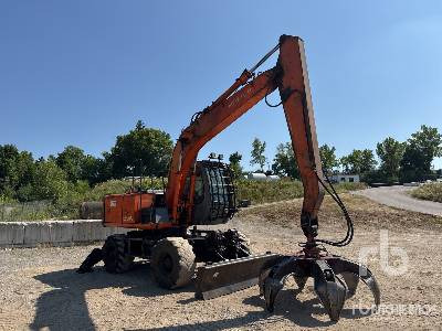 HITACHI ZX130W Pelle Sur Pneus - Overslagkraan: afbeelding 4 HITACHI ZX130W Pelle Sur Pneus - Overslagkraan: afbeelding 4