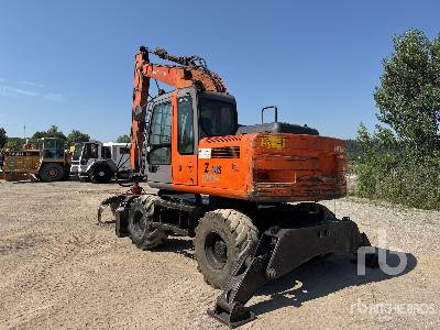 HITACHI ZX130W Pelle Sur Pneus - Overslagkraan: afbeelding 2 HITACHI ZX130W Pelle Sur Pneus - Overslagkraan: afbeelding 2