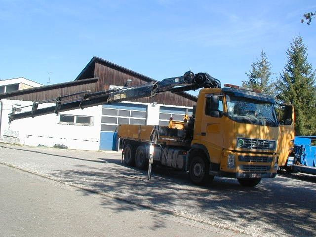 Volvo FH 12 6x4 Volvo FH 12 6x4 - Vrachtwagen met open laadbak, Kraanwagen: afbeelding 1 Volvo FH 12 6x4 Volvo FH 12 6x4 - Vrachtwagen met open laadbak, Kraanwagen: afbeelding 1