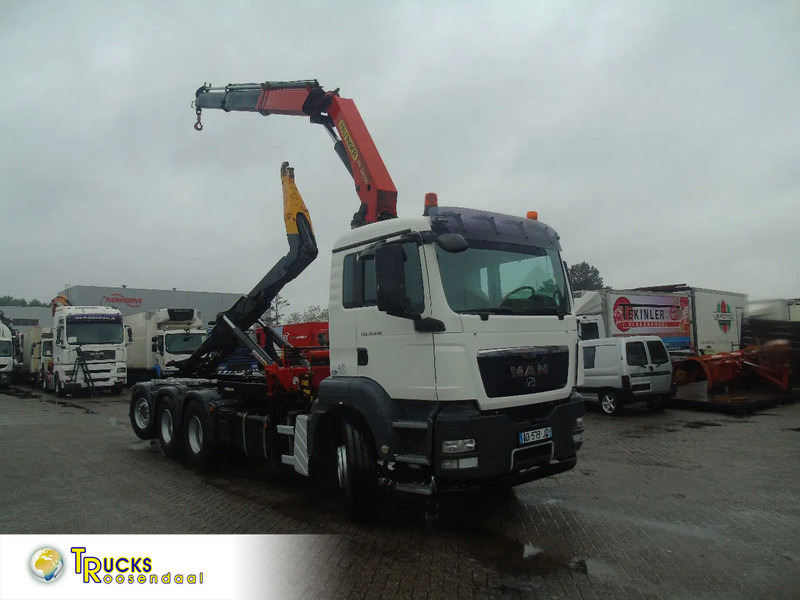 MAN TGS 35.440 + PALFINGER 24500 + 8X4 + EURO 5 + REMOTE - Haakarmsysteem vrachtwagen, Kraanwagen: afbeelding 1 MAN TGS 35.440 + PALFINGER 24500 + 8X4 + EURO 5 + REMOTE - Haakarmsysteem vrachtwagen, Kraanwagen: afbeelding 1