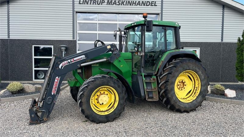 John Deere 6910 Auto Quad II-TLS Med frontlæsser - Tractor: afbeelding 1 John Deere 6910 Auto Quad II-TLS Med frontlæsser - Tractor: afbeelding 1