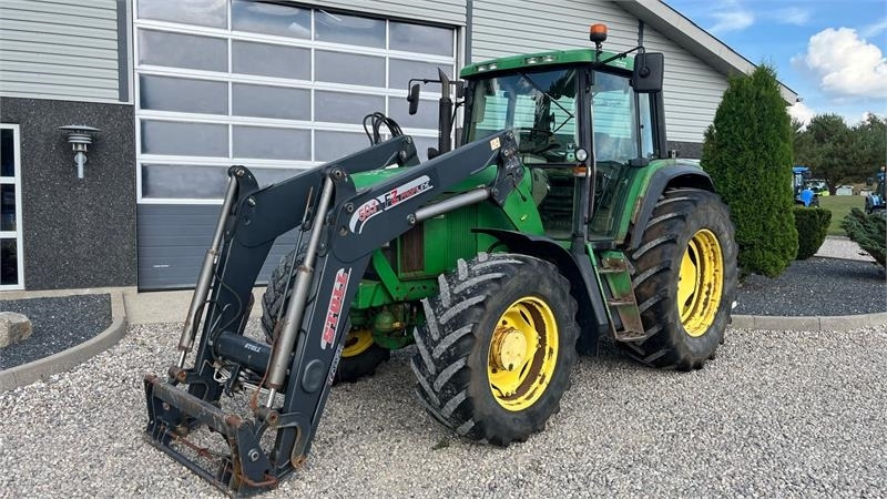 John Deere 6910 Auto Quad II-TLS Med frontlæsser - Tractor: afbeelding 2 John Deere 6910 Auto Quad II-TLS Med frontlæsser - Tractor: afbeelding 2