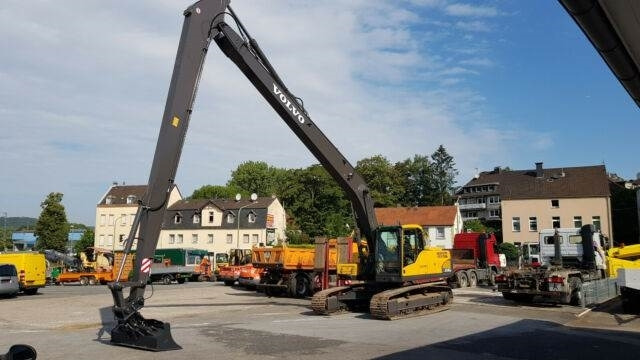 Volvo Ec 250 DNL mit Neu Long REach Arm 16 m - Rupsgraafmachine: afbeelding 1 Volvo Ec 250 DNL mit Neu Long REach Arm 16 m - Rupsgraafmachine: afbeelding 1