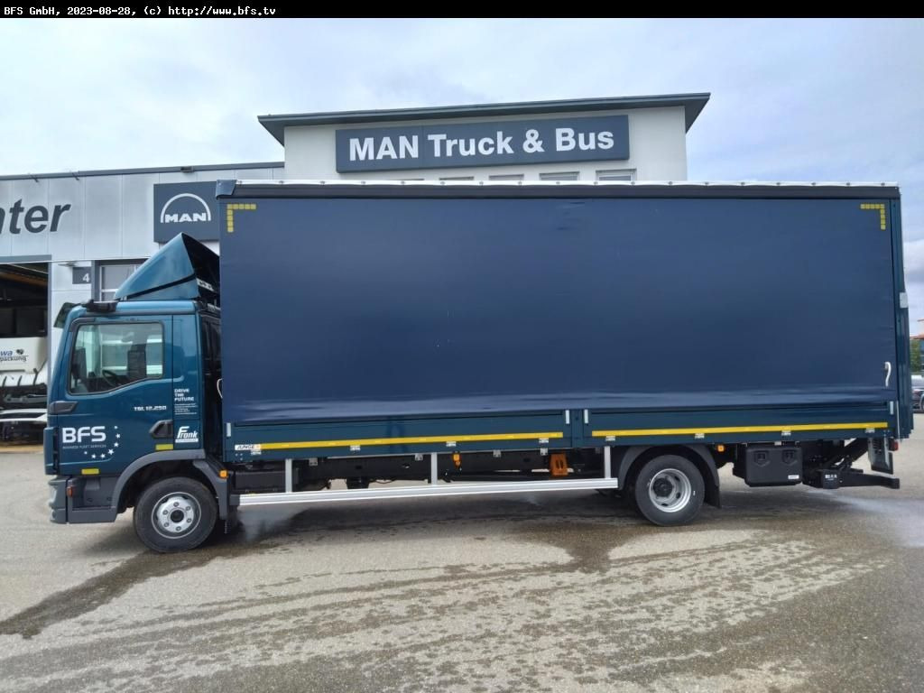 MAN TGL (TG3) 12.250 4x2 BL CH Plane und Spiegel, LB - Schuifzeilen vrachtwagen: afbeelding 3 MAN TGL (TG3) 12.250 4x2 BL CH Plane und Spiegel, LB - Schuifzeilen vrachtwagen: afbeelding 3
