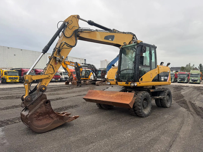 Caterpillar M313D 7212 HOURS - Mobiele graafmachine: afbeelding 4 Caterpillar M313D 7212 HOURS - Mobiele graafmachine: afbeelding 4