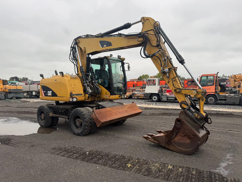 Caterpillar M313D 7212 HOURS - Mobiele graafmachine: afbeelding 3 Caterpillar M313D 7212 HOURS - Mobiele graafmachine: afbeelding 3