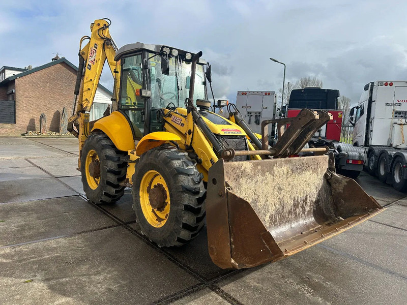 New Holland LB115B, CE, 240 MM MULTI PURPOSE LOADER BUCKET, 800 MM BACHOE DIGGING BUCKET, FLIP OVER FORKS, AIR CONDITIONER - Graaflaadmachine: afbeelding 5 New Holland LB115B, CE, 240 MM MULTI PURPOSE LOADER BUCKET, 800 MM BACHOE DIGGING BUCKET, FLIP OVER FORKS, AIR CONDITIONER - Graaflaadmachine: afbeelding 5