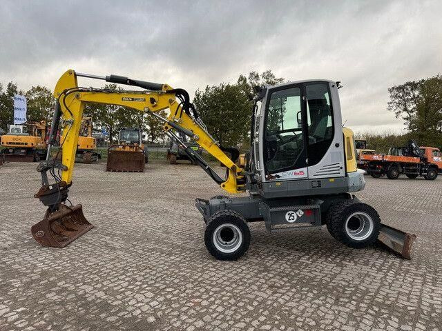 Neuson EW65, Verstellausleger, Hydr. S.W.S.,Div. Löffel - Mobiele graafmachine: afbeelding 2 Neuson EW65, Verstellausleger, Hydr. S.W.S.,Div. Löffel - Mobiele graafmachine: afbeelding 2