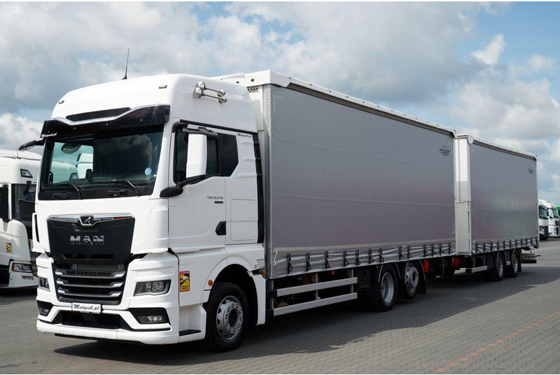 MAN TGX 26.470 / ZESTAW TANDEM 120 M3 / PRZEJAZDOWY / I-PARK COOL / - Schuifzeilen vrachtwagen: afbeelding 1 MAN TGX 26.470 / ZESTAW TANDEM 120 M3 / PRZEJAZDOWY / I-PARK COOL / - Schuifzeilen vrachtwagen: afbeelding 1