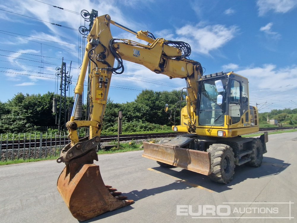2016 Komatsu PW148-8 - Mobiele graafmachine: afbeelding 1 2016 Komatsu PW148-8 - Mobiele graafmachine: afbeelding 1
