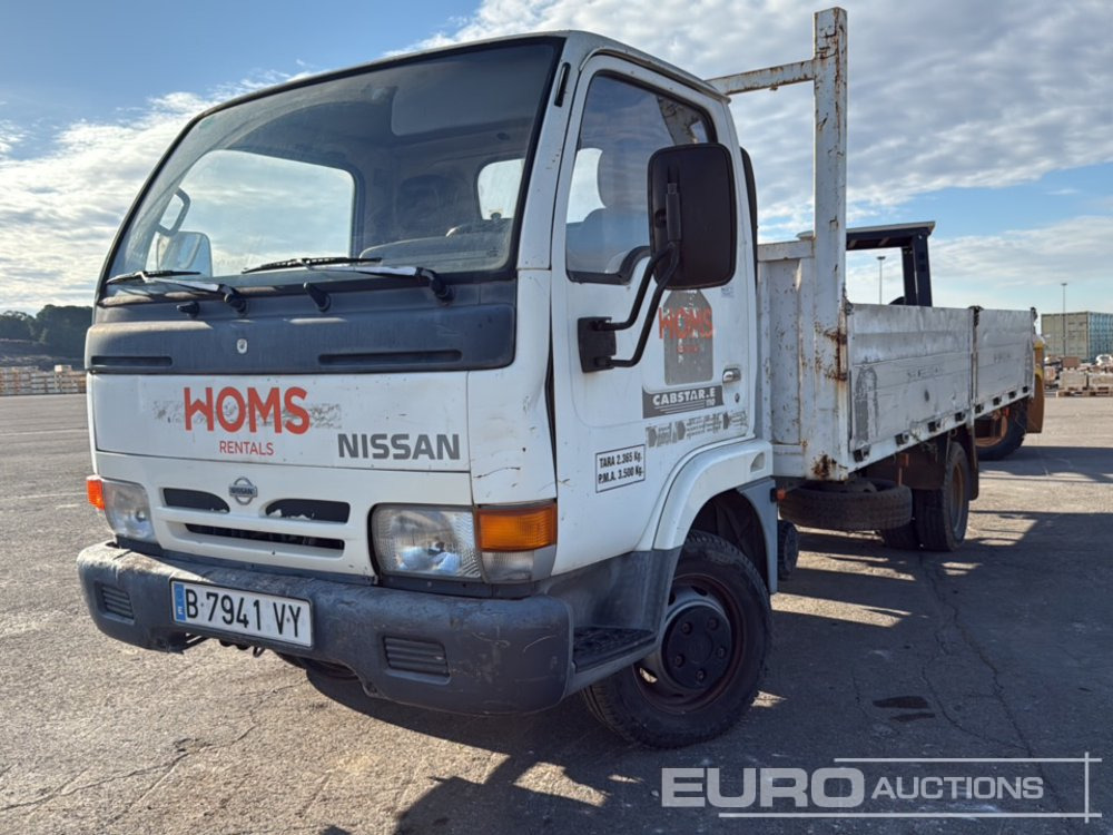 1999 Nissan Cabstar - Vrachtwagen met open laadbak: afbeelding 1 1999 Nissan Cabstar - Vrachtwagen met open laadbak: afbeelding 1