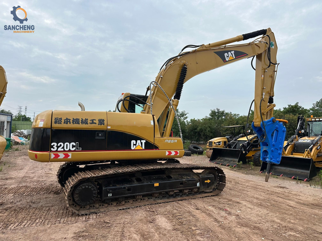 CAT 320CL with hammer crawler excavator - Rupsgraafmachine: afbeelding 1 CAT 320CL with hammer crawler excavator - Rupsgraafmachine: afbeelding 1
