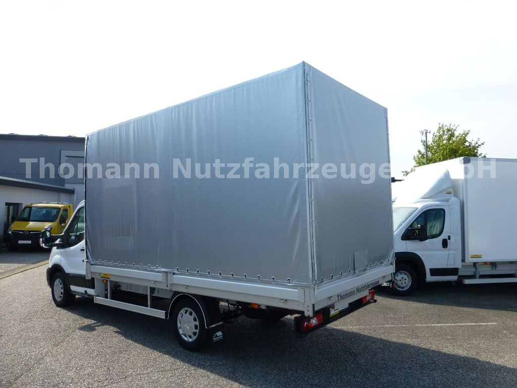 Ford Transit Pritsche Plane 4,25m Klima Temp. DAB Ford Transit Pritsche Plane 4,25m Klima Temp. DAB - Huifzeil bedrijfswagen: afbeelding 5 Ford Transit Pritsche Plane 4,25m Klima Temp. DAB Ford Transit Pritsche Plane 4,25m Klima Temp. DAB - Huifzeil bedrijfswagen: afbeelding 5