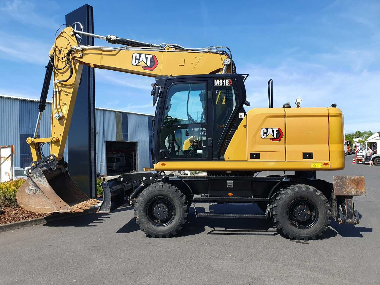 CAT M318 / 2022 / nur 286h! / Tieflöffel / Pratzen - Mobiele graafmachine: afbeelding 2 CAT M318 / 2022 / nur 286h! / Tieflöffel / Pratzen - Mobiele graafmachine: afbeelding 2
