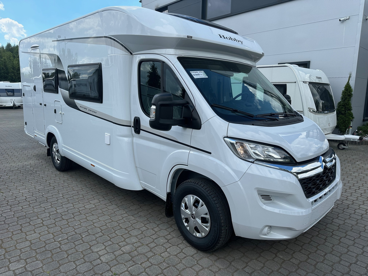 Hobby Optima T65 HKM Ontour 2024 - Half integraal camper: afbeelding 2 Hobby Optima T65 HKM Ontour 2024 - Half integraal camper: afbeelding 2