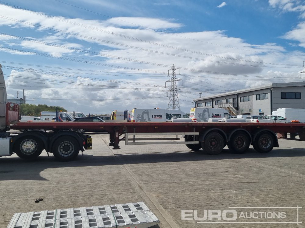 2011 Dennison Tri Axle Flatbed Trailer - Vlakke/ Open oplegger: afbeelding 2 2011 Dennison Tri Axle Flatbed Trailer - Vlakke/ Open oplegger: afbeelding 2