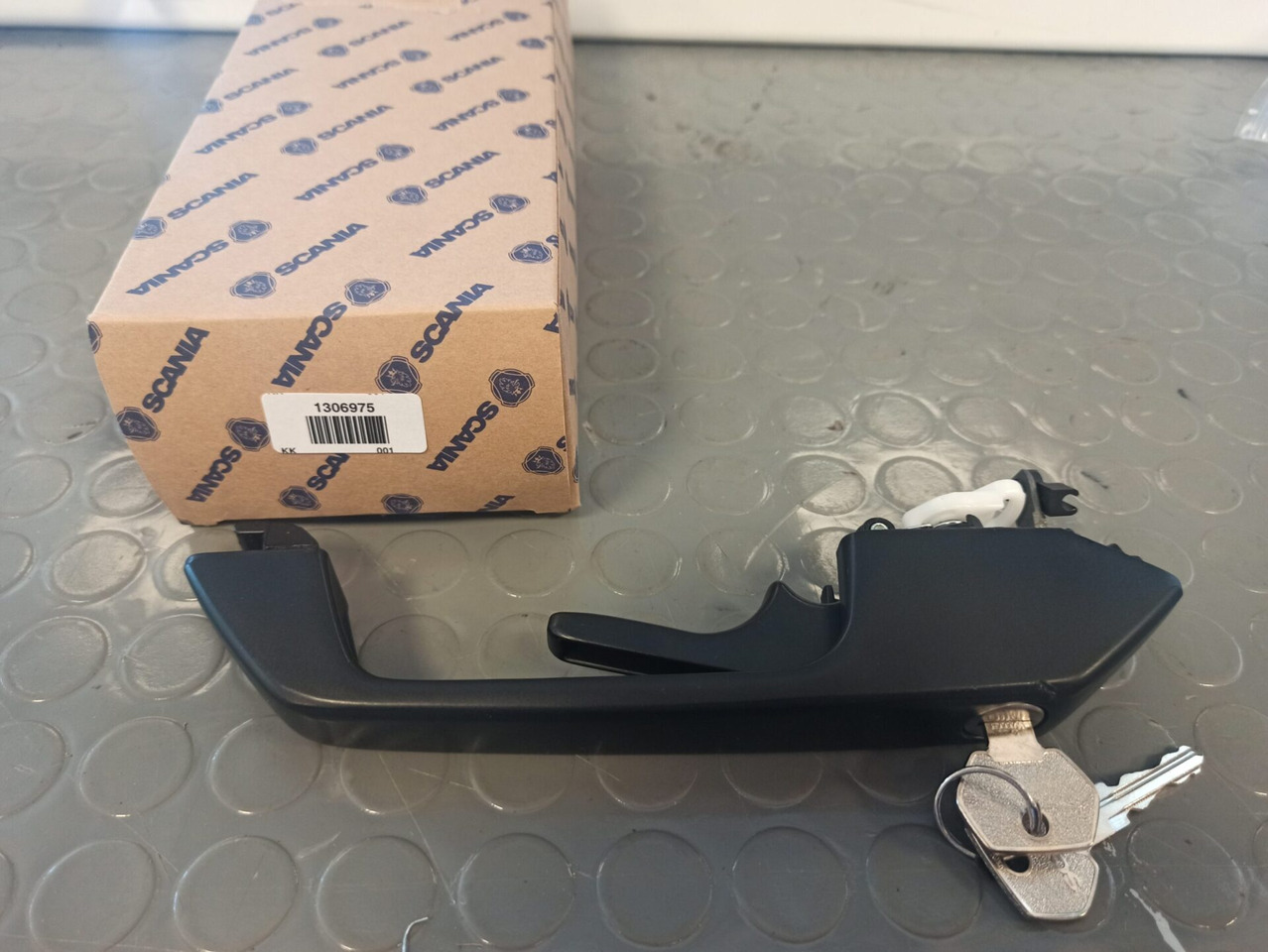 SCANIA DOOR HANDLE - 1306975 - Deur en onderdelen voor Vrachtwagen: afbeelding 1 SCANIA DOOR HANDLE - 1306975 - Deur en onderdelen voor Vrachtwagen: afbeelding 1