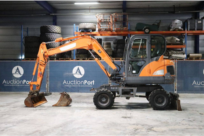 Doosan DX55WK - Mobiele graafmachine: afbeelding 2 Doosan DX55WK - Mobiele graafmachine: afbeelding 2